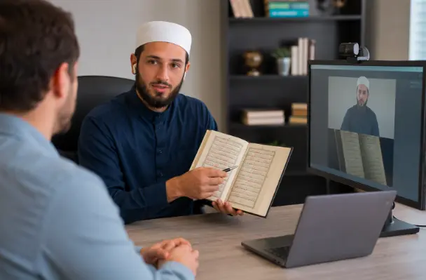 An Islamic tutor holding open the Holy Quran to teach a student how to learn Quran online through a live video session.